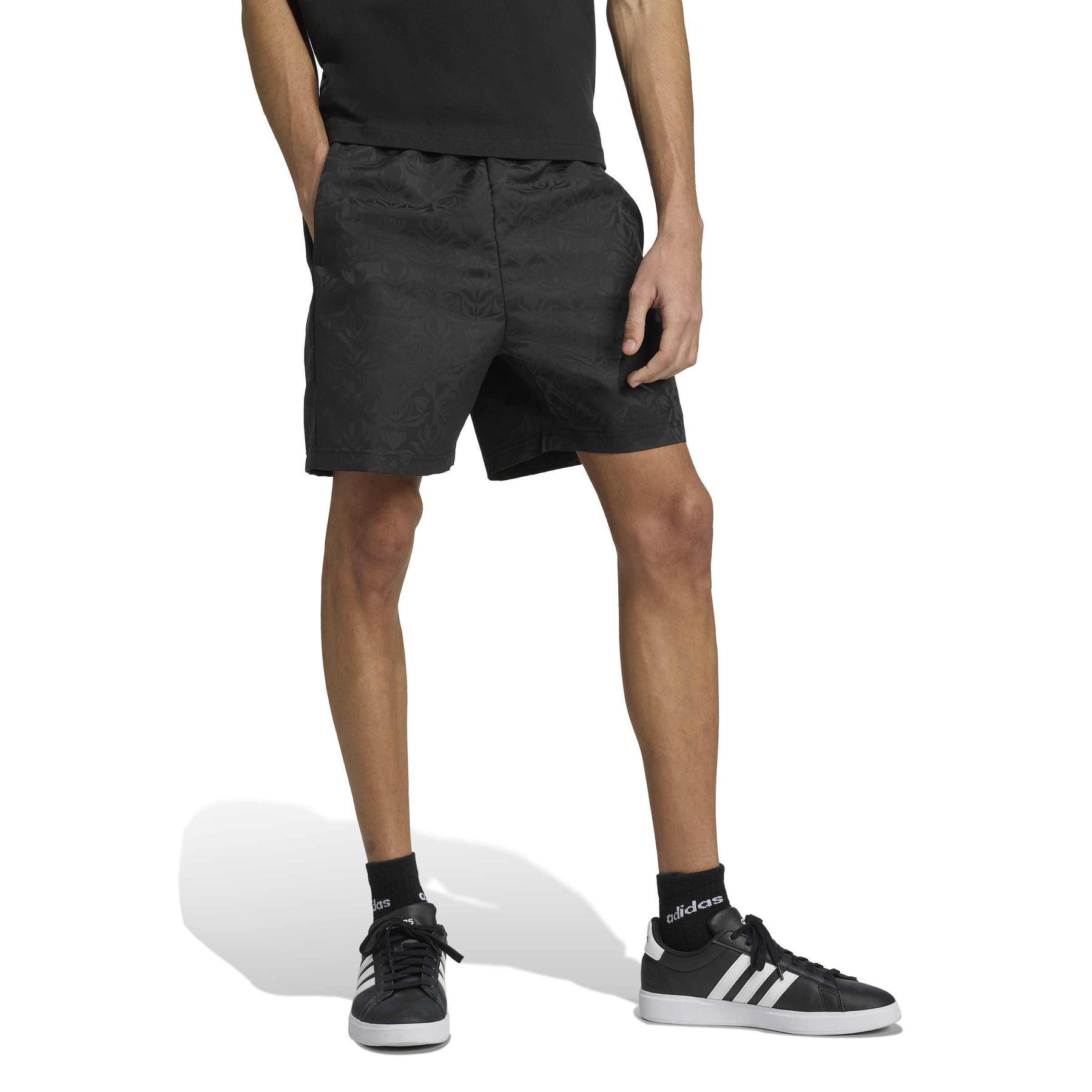 product/a/d/adidas_jm1755_4_apparel_on_model_walking_view_white.jpg