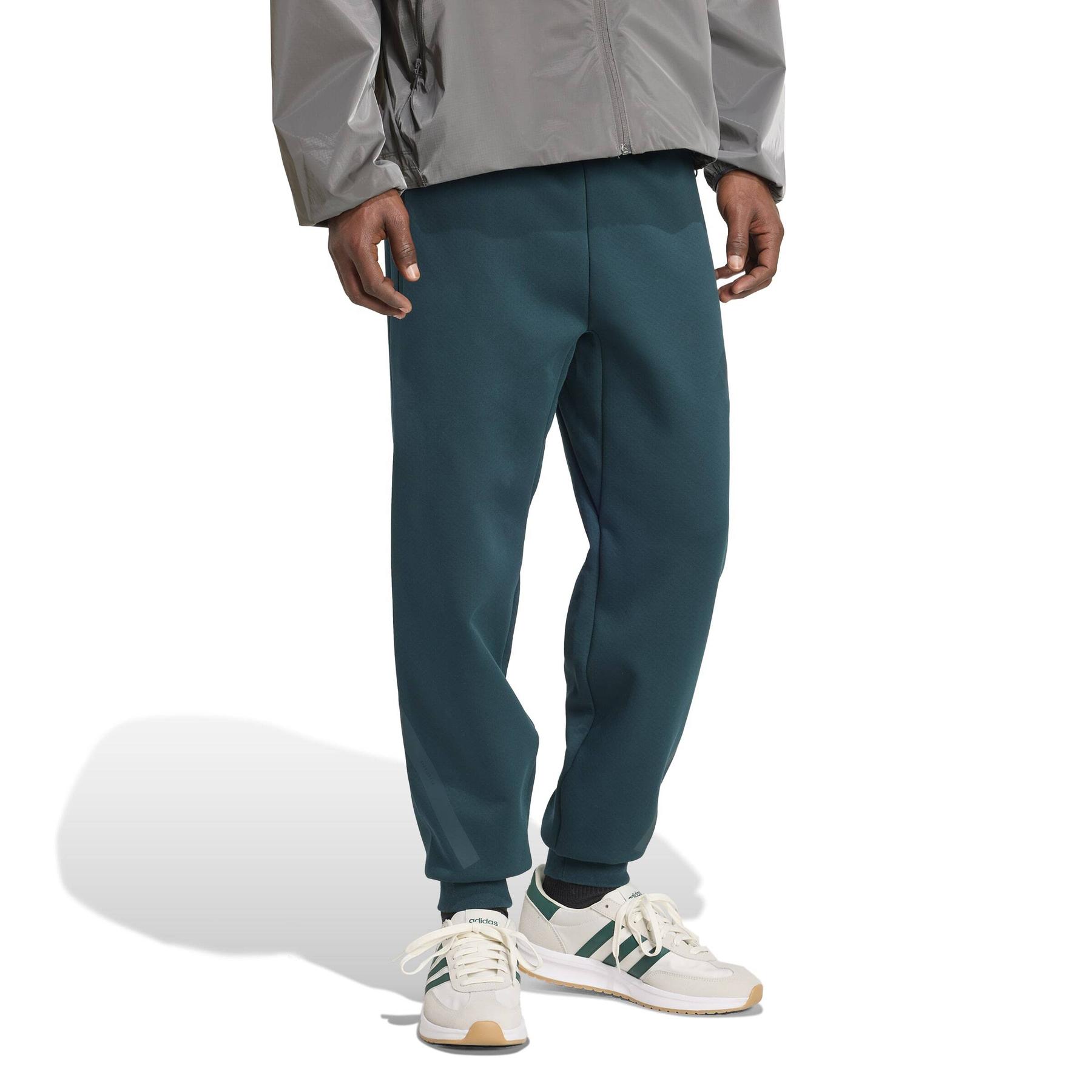product/a/d/adidas_jw4724_4_apparel_on_model_walking_view_white.jpg