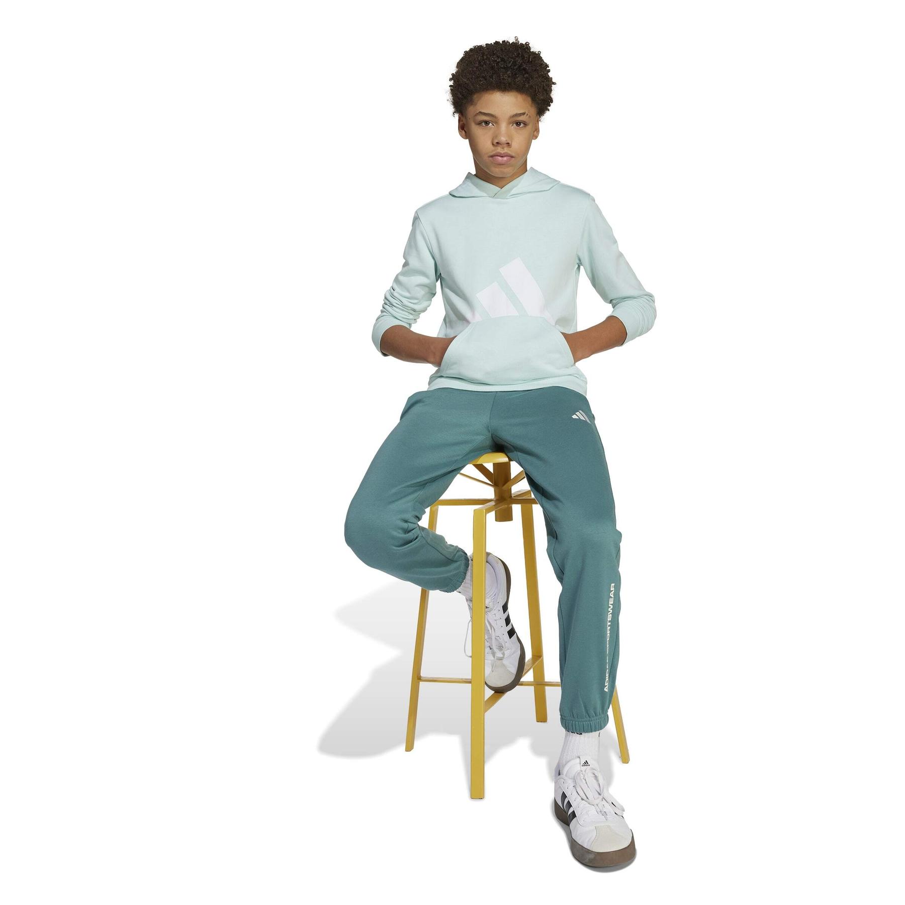 product/a/d/adidas_kc2777_4_apparel_on_model_walking_view_white.jpg