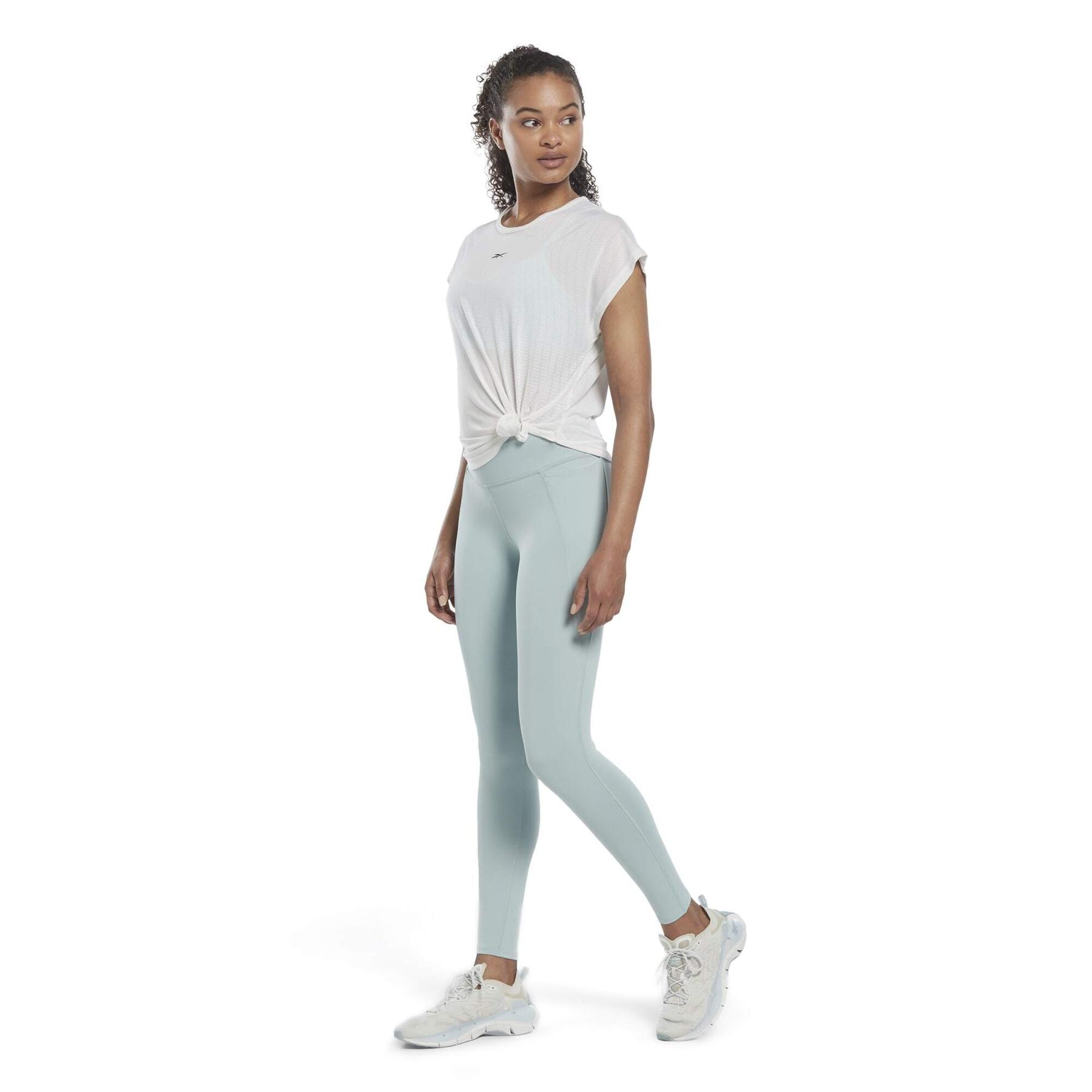 r/e/reebok_hk4795_4_apparel_on_model_side_view_white.jpg
