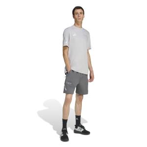 2/0/2025_adidas_jw3479_4_apparel_on_model_walking_view_white.jpg