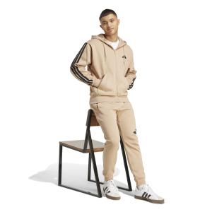 2/0/2025_adidas_jx0745_4_apparel_on_model_walking_view_white.jpg