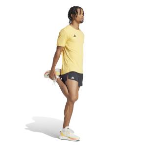 a/d/adidas_in1159_5_apparel_on_model_walking_view_white-nw040724.jpg