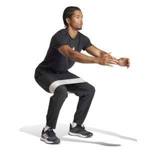 a/d/adidas_it5457_5_apparel_on_model_walking_view_white.jpg